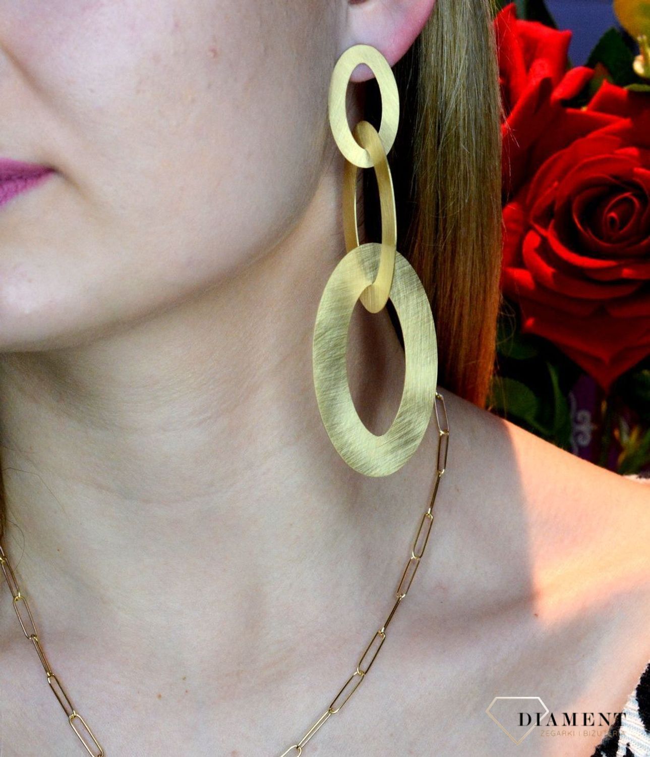 Srebrne kolczyki duże owalne w pozłoceniu OR AQ H0460304. Idealny pomysł na prezent. Kolczyki wykonane z najwyższej jakości srebra próby 925. Idealne kolczyki na uroczystość. Długość całkowita 11 cm..jpg